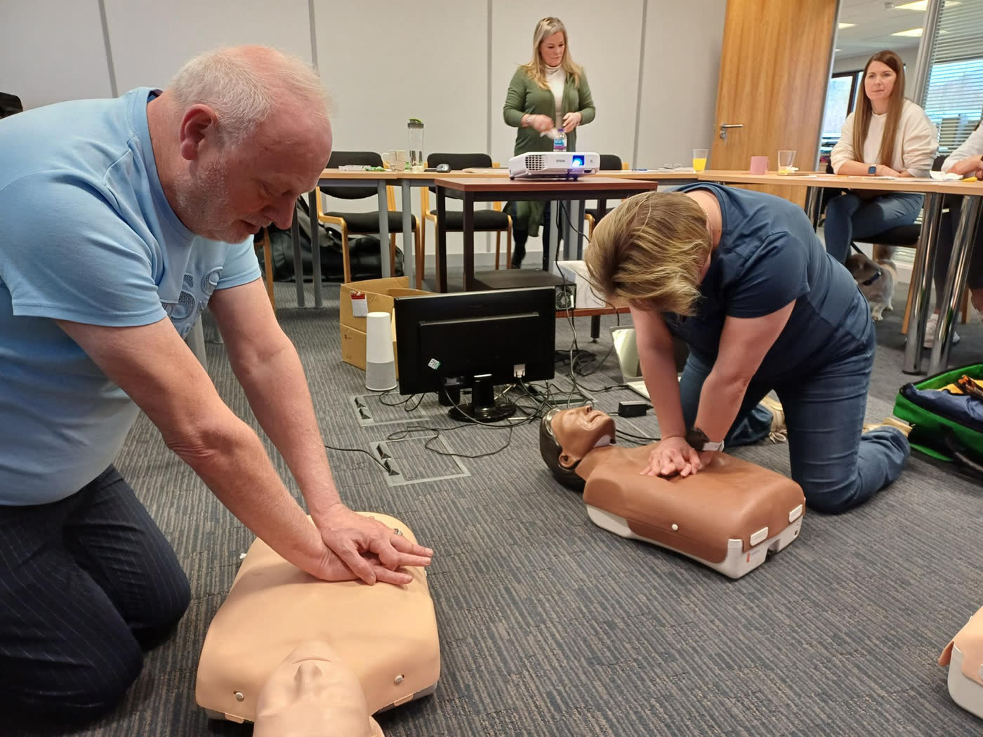 A first aid course in progress at a workplace