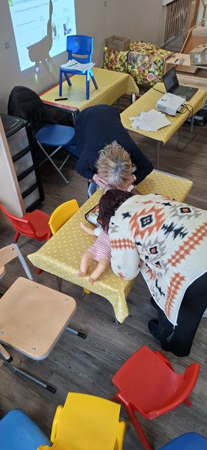 A practical infant first aid exercise during a paediatric first aid course